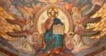MILAN, ITALY - MARCH 6, 2024: The frosco Jesus the Pantokrator and Teacher among the angels in the church Basilica di Santa Eufemia by Luigi Cavenaghi from end of 19. cent.
